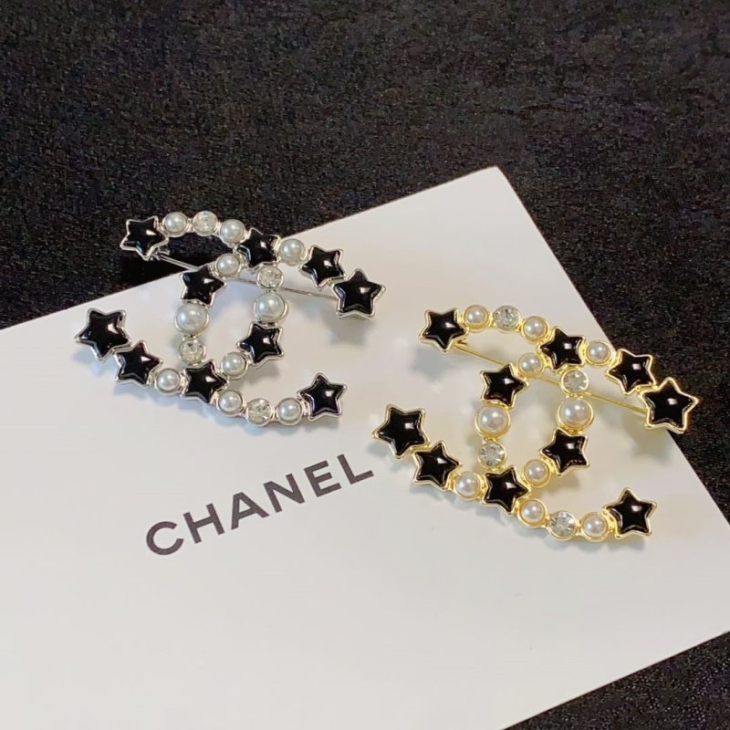 Ch**el brooches